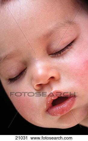 Newborn sleeping View Large Photo Image Stock Image - Newborn sleeping. Fotosearch