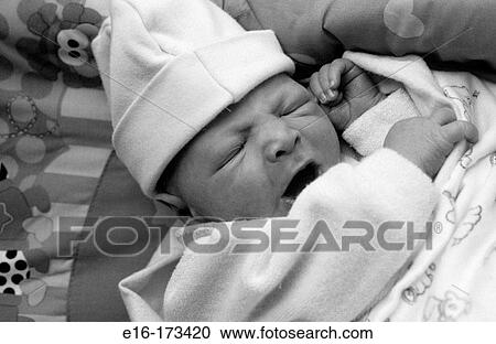 Stock Image - Newborn yawning. Fotosearch