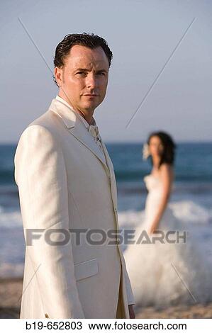 Newly married couple on the beach. View Large Photo Image Stock Image - Newly married couple on the beach.. Fotosearch