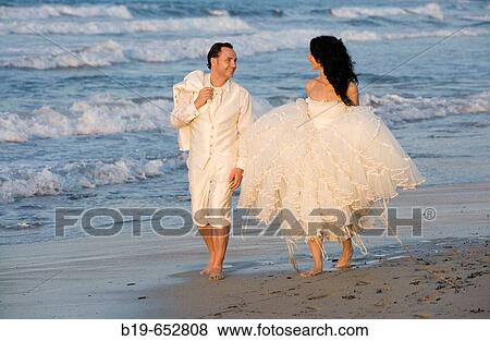 Newly married couple on the beach. View Large Photo Image Stock Photo - Newly married couple on the beach.. Fotosearch
