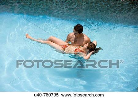 Newlywed Couple in pool View Large Photo Image Stock Photography - Newlywed Couple in pool. Fotosearch