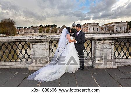 Newlyweds at Castel Sant? Angelo bridge Rome Italy View Large Photo Image Stock Photograph - Newlyweds at Castel Sant? Angelo bridge Rome Italy. Fotosearch