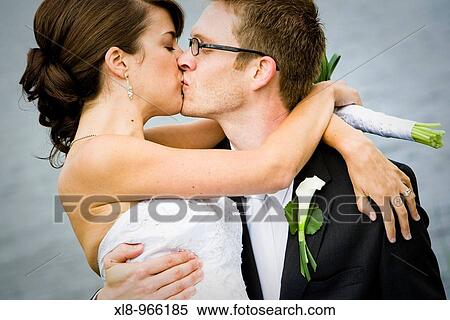 Stock Photography - Newlyweds, Bride and Groom, outdoor portraits. Fotosearch