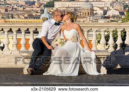 Newlyweds overlooking the city of Rome, Italy. View Large Photo Image Stock Photo - Newlyweds overlooking the city of Rome, Italy.. Fotosearch
