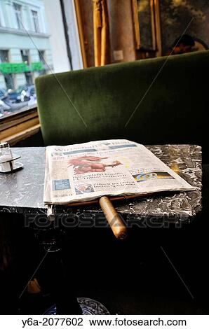 Newspaper on table, coffee house, Vienna, Austria. View Large Photo Image Stock Image - Newspaper on table, coffee house, Vienna, Austria.. Fotosearch