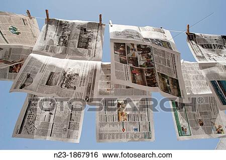 Newspapers lying, Valencia View Large Photo Image Stock Photograph - Newspapers lying, Valencia. Fotosearch