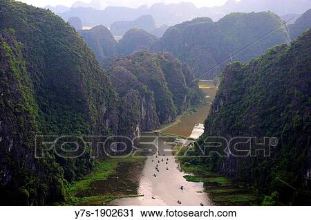 Stock Image - Ngo Dong River in Tam Coc, Vietnam, South East Asia, Asia. Fotosearch