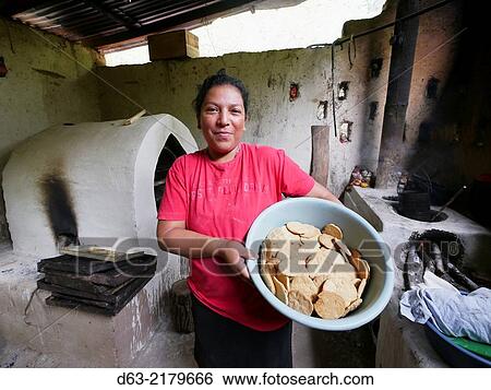Nicaragua. FEDICAMP projects. House of Alba Nubia Gonzales Vallecillo (36), single mother with one daughter aged 10. Riita community. Alba with her oven which she uses to make biscuits which she sells. View Large Photo Image Stock Photograph - Nicaragua. FEDICAMP projects. House of Alba Nubia Gonzales Vallecillo (36), single mother with one daughter aged 10. Riita community. Alba with her oven which she uses to make biscuits which she sells.. Fotosearch