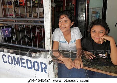 Nicaragua, Managua, family business, neighborhood cafeteria, low end, ramshackle, counter, Hispanic, girl, child, friends, tween, teen, crossed eyed, strabismus, lazy eye, View Large Photo Image Stock Image - Nicaragua, Managua, family business, neighborhood cafeteria, low end, ramshackle, counter, Hispanic, girl, child, friends, tween, teen, crossed eyed, strabismus, lazy eye,. Fotosearch