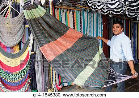 Nicaragua, Managua, Mercado Roberto Huembes, market, marketplace, shopping, store, vendor, business, hammock, braided rope, Hispanic, man, salesman, display, self-employed, View Large Photo Image Stock Image - Nicaragua, Managua, Mercado Roberto Huembes, market, marketplace, shopping, store, vendor, business, hammock, braided rope, Hispanic, man, salesman, display, self-employed,. Fotosearch