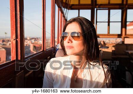 Nice woman in a Marrakech's restaurant looking through the window View Large Photo Image Stock Image - Nice woman in a Marrakech's restaurant looking through the window. Fotosearch