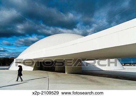 Niemeyer Center building, in Aviles, Spain, The cultural center was designed by Brazilian architect Oscar Niemeyer, was his only work in Spain. Aviles, Spain. View Large Photo Image Stock Photo - Niemeyer Center building, in Aviles, Spain, The cultural center was designed by Brazilian architect Oscar Niemeyer, was his only work in Spain. Aviles, Spain.. Fotosearch