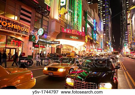 Stock Photo - Night in Times Square, New York City. Fotosearch