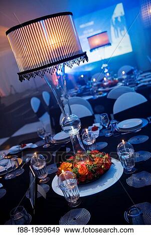 Stock Photo - Night scene table setting, Sandton, Johannesburg, South Africa. Fotosearch