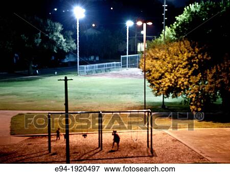 Night time playground scene, Dallas, Texas, USA View Large Photo Image Stock Photo - Night time playground scene, Dallas, Texas, USA. Fotosearch