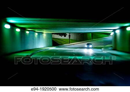 Night time street scene in a road underpass, Dallas, Texas, USA View Large Photo Image Stock Image - Night time street scene in a road underpass, Dallas, Texas, USA. Fotosearch