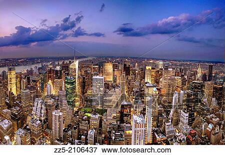Stock Photo - night time view of midtown after sunset.. Fotosearch
