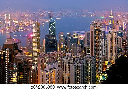 Night view across the skyscrapers in Central District and the Victoria Harbour to Kowloon, Hong Kong. View Large Photo Image Stock Image - Night view across the skyscrapers in Central District and the Victoria Harbour to Kowloon, Hong Kong.. Fotosearch