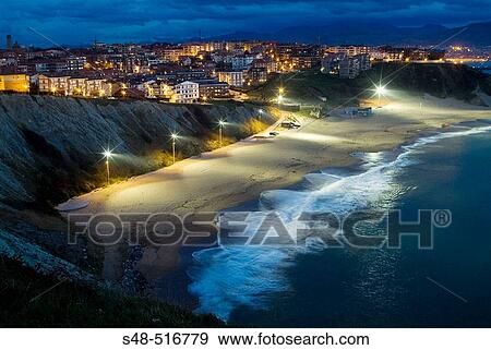Night view of Arrigunaga beach from Aixerrota windmill, Getxo. Biscay, Euskadi, Spain View Large Photo Image Stock Photo - Night view of Arrigunaga beach from Aixerrota windmill, Getxo. Biscay, Euskadi, Spain. Fotosearch