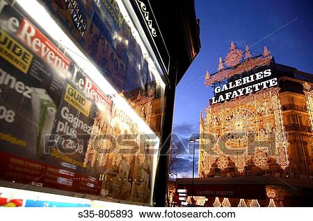 Night view of Galeries Lafayette with Christmas lights decoration, Paris. France View Large Photo Image Stock Image - Night view of Galeries Lafayette with Christmas lights decoration, Paris. France. Fotosearch