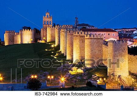 Night view of medieval city walls, the best preserved ones in Spain. They date from 1090, with 2, 5 km long, 88 towers and 6 gates.? vila (city added to the Unesco's World Heritage List in 1985). Castilla-Le? n. Spain View Large Photo Image Picture - Night view of medieval city walls, the best preserved ones in Spain. They date from 1090, with 2, 5 km long, 88 towers and 6 gates.? vila (city added to the Unesco's World Heritage List in 1985). Castilla-Le? n. Spain. Fotosearch