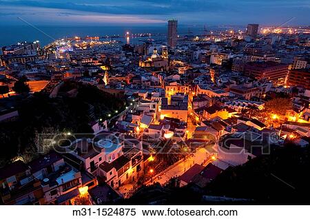 Night view of the city of Alicante from Santa Barbara Castle Alicante province, Valencian Community, Spain, Europe View Large Photo Image Stock Photography - Night view of the city of Alicante from Santa Barbara Castle Alicante province, Valencian Community, Spain, Europe. Fotosearch