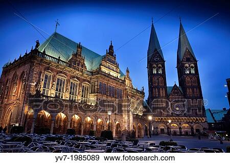 Stock Photo - Night view of the market square (Marktplatz) with the City Hall building in foreground (World Heritage Site by Unesco), and St. Peter Cathedral. (St Petry Dom) at the bottom. Bremen, Germany, Europe.. Fotosearch