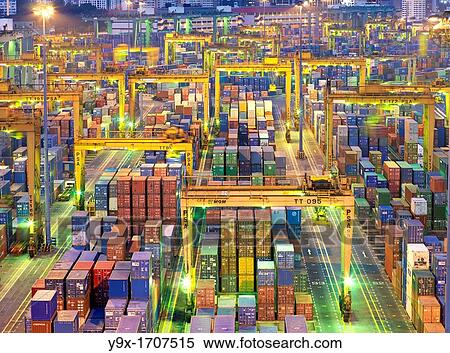 Night view of the Port of Singapore Authority PSA in Singapore PSA Singapore Terminals is the world largest container transhipment hub, handling about one-fifth of the world's total container transhipment throughput View Large Photo Image Stock Photography - Night view of the Port of Singapore Authority PSA in Singapore PSA Singapore Terminals is the world largest container transhipment hub, handling about one-fifth of the world's total container transhipment throughput. Fotosearch