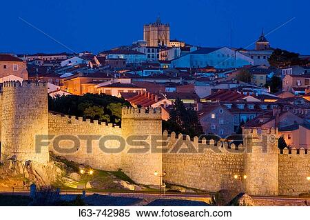 Night view of? vila with the Medieval city walls, the best preserved ones in Spain. They date from 1090, with 2, 5 km long, 88 towers and 6 gates.? vila (city added to the Unesco's World Heritage List in 1985). Castilla-Le? n. Spain View Large Photo Image Stock Photography - Night view of? vila with the Medieval city walls, the best preserved ones in Spain. They date from 1090, with 2, 5 km long, 88 towers and 6 gates.? vila (city added to the Unesco's World Heritage List in 1985). Castilla-Le? n. Spain. Fotosearch