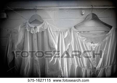 Stock Photography - nightdress hanging in an antique antique. Fotosearch
