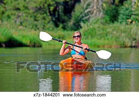 Nikki Tate kayaking on the North Fork of the Payette River near Payette Lake and the city of McCall in the Salmon River Mountains of central Idaho View Large Photo Image Stock Image - Nikki Tate kayaking on the North Fork of the Payette River near Payette Lake and the city of McCall in the Salmon River Mountains of central Idaho. Fotosearch