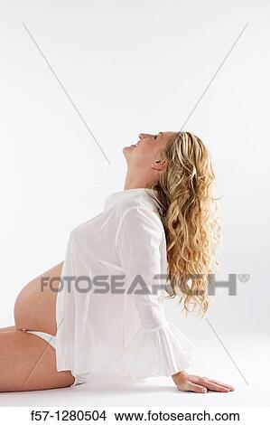 Nine months pregnant mother to be View Large Photo Image Picture - Nine months pregnant mother to be. Fotosearch