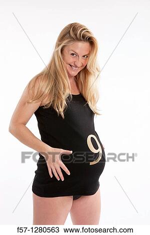 Nine months pregnant mother to be View Large Photo Image Stock Image - Nine months pregnant mother to be. Fotosearch