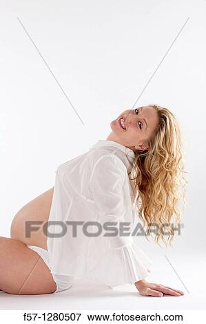 Nine months pregnant mother to be View Large Photo Image Stock Photo - Nine months pregnant mother to be. Fotosearch