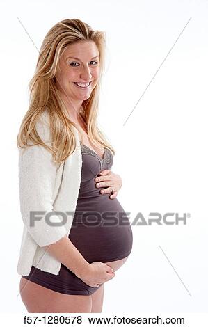 Nine months pregnant mother to be View Large Photo Image Stock Photo - Nine months pregnant mother to be. Fotosearch