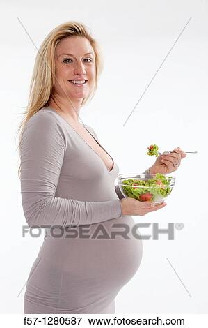 Nine months pregnant mother to be View Large Photo Image Stock Photo - Nine months pregnant mother to be. Fotosearch