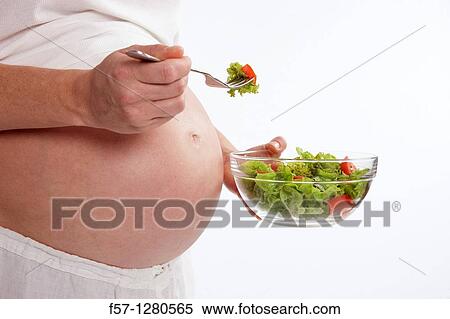 Nine months pregnant mother to be View Large Photo Image Stock Photography - Nine months pregnant mother to be. Fotosearch
