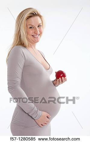 Nine months pregnant mother to be View Large Photo Image Stock Photography - Nine months pregnant mother to be. Fotosearch