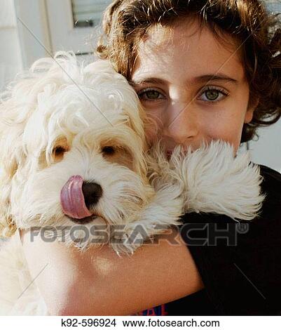 Nine_year_old girl and a dog. View Large Photo Image Picture - Nine_year_old girl and a dog.. Fotosearch