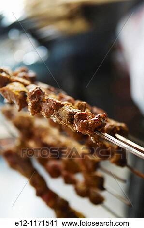Nizwa market, lamb skewer. View Large Photo Image Stock Image - Nizwa market, lamb skewer.. Fotosearch