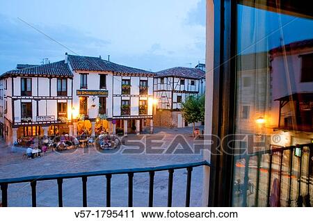 Stock Image - Nocturnal view from an open window. Doa Urraca Square, Covarrubias, Burgos province, Castilla Leon, Spain.. Fotosearch