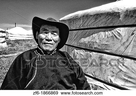 Stock Photo - Nomadic Villager next to Ger in rural Mongolia. Fotosearch