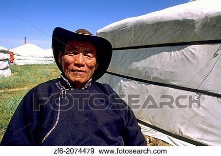 Nomadic Villager next to Ger in rural Mongolia. View Large Photo Image Stock Photo - Nomadic Villager next to Ger in rural Mongolia.. Fotosearch