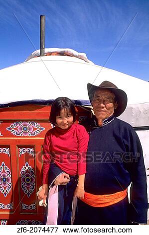 Nomadic Villager with Granddaughter next to Ger rural Mongolia. View Large Photo Image Stock Photo - Nomadic Villager with Granddaughter next to Ger rural Mongolia.. Fotosearch