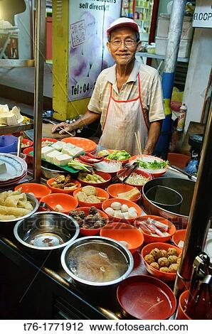 noodles and fishball soup vendor at a hawker court in Penang, Malaysia View Large Photo Image Stock Image - noodles and fishball soup vendor at a hawker court in Penang, Malaysia. Fotosearch