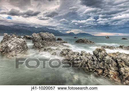 Nor? west storm clouds, Kaikoura headland, North Canterbury, New Zealand. View Large Photo Image Stock Photo - Nor? west storm clouds, Kaikoura headland, North Canterbury, New Zealand.. Fotosearch