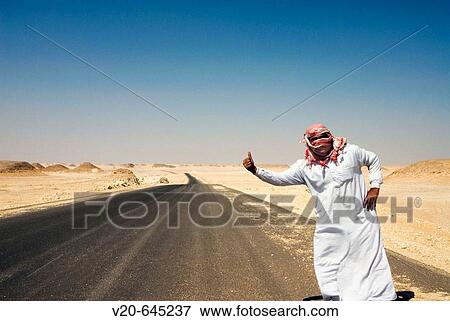 North west desert, road and Bedouin hitch hiking. Egypt View Large Photo Image Stock Photo - North west desert, road and Bedouin hitch hiking. Egypt. Fotosearch