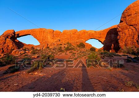 North Window and South Window. Water and ice, extreme temperatures, and underground salt movement are responsible for the scultured rock scenery of Arches National Park. View Large Photo Image Stock Image - North Window and South Window. Water and ice, extreme temperatures, and underground salt movement are responsible for the scultured rock scenery of Arches National Park.. Fotosearch