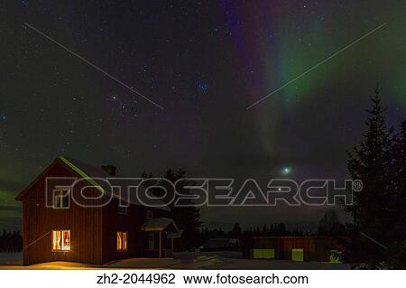 Northern light, aurora borealis in G? llivare, Swedish lapland with a house and light shining through the window and snow outside in the month of march. View Large Photo Image Stock Image - Northern light, aurora borealis in G? llivare, Swedish lapland with a house and light shining through the window and snow outside in the month of march.. Fotosearch