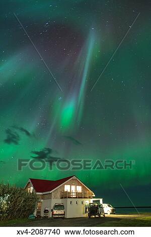 Northern lights above small village of Bleidabollstadur, Vatnajokull National Park, Iceland. View Large Photo Image Stock Image - Northern lights above small village of Bleidabollstadur, Vatnajokull National Park, Iceland.. Fotosearch